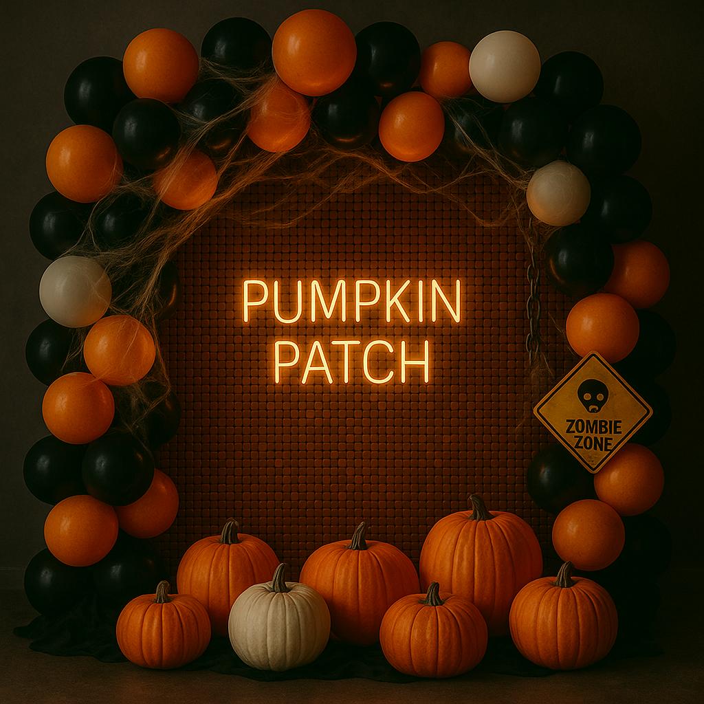 Festive Halloween balloon display with pumpkins